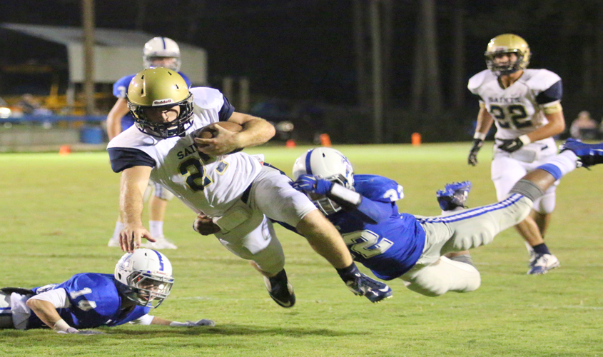 Saints Win Big in First District Game