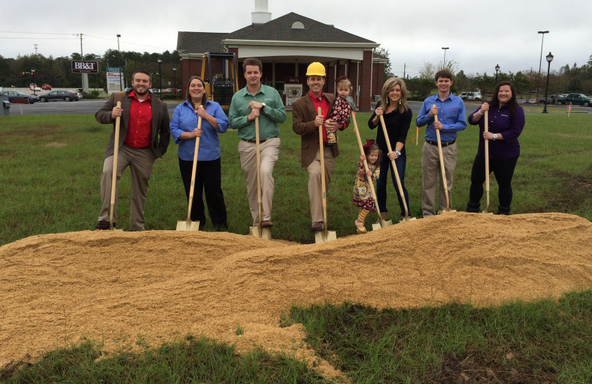 The Honeas break ground on Shopping Center