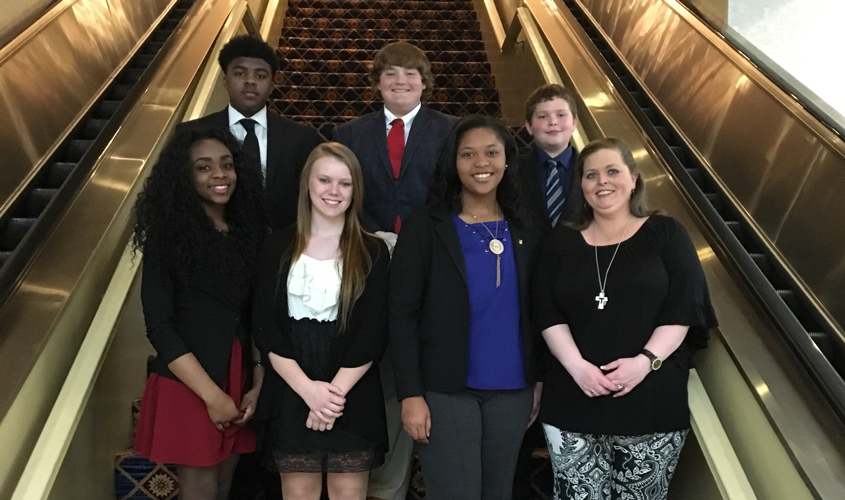 Adams, Ammann, and Lombardi Place During DECA Competition