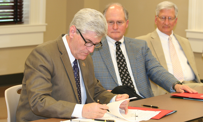 Governor signs child protection legislation 