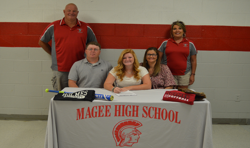 Warren Signs with Holmes