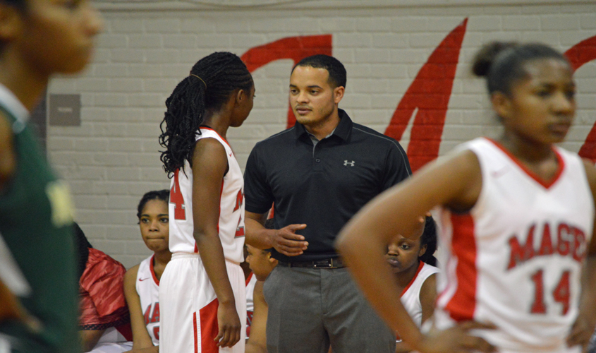 Trojans Win First District Game