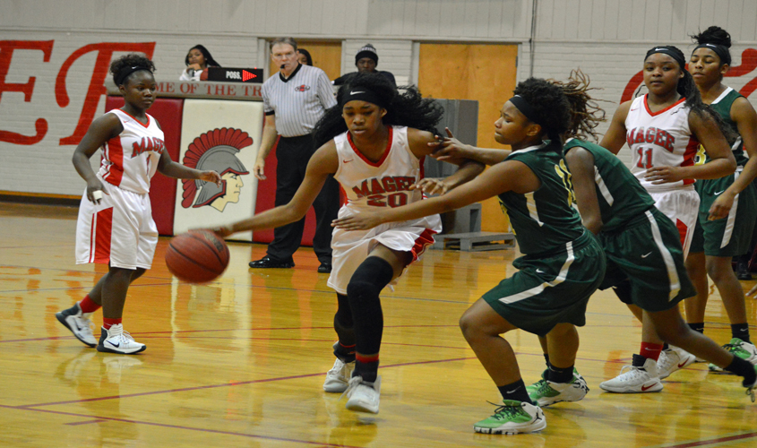 Trojans Win First District Game