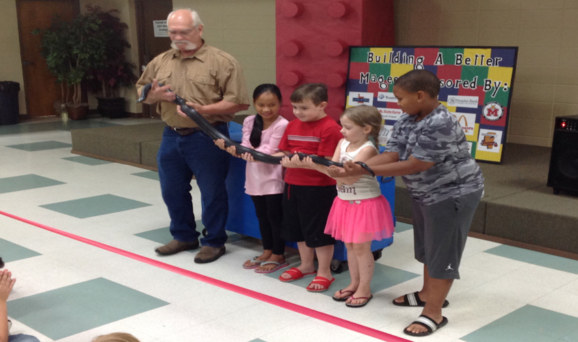 Snake Man visits library