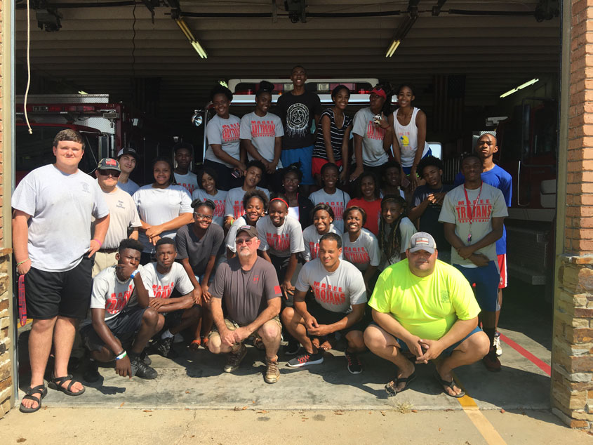 Trojan Basketball Teams Give Back to the City