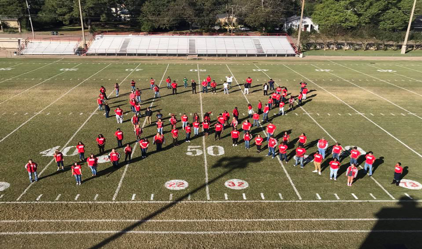 Seniors Tied A Red Ribbon
