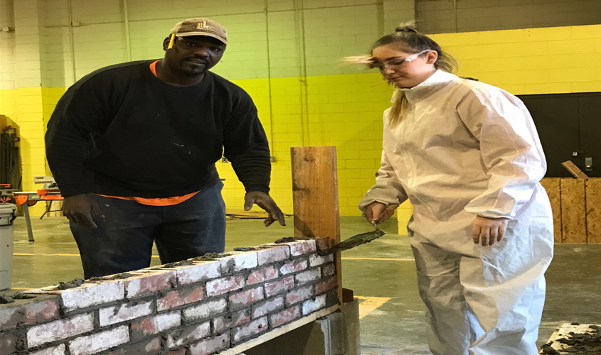 Tech Students Learn Bricklaying Techniques