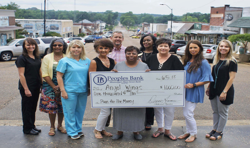 Angel Wings Accepts Check From  Run for the Money