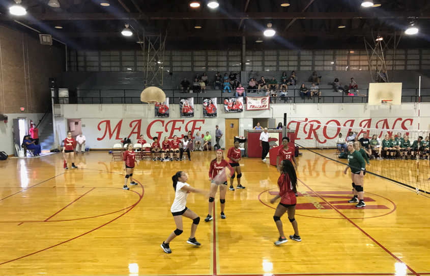 Trojans Battle the Mustangs