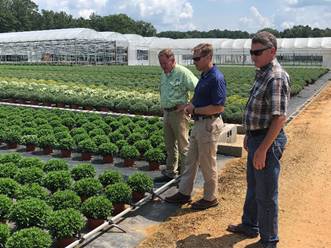 Congressman Guest Visits with Farmers Across the District