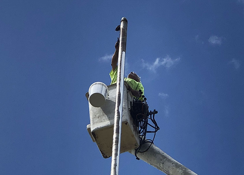 Highway 49 Flag Pole Gets a Paint Job
