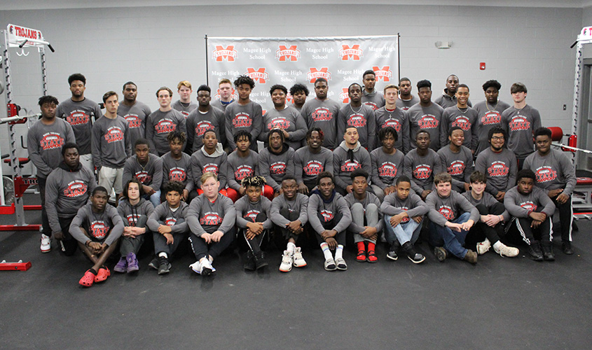 MGH Donates T-Shirts to Football Team