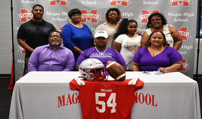 Grims Signs with Millsaps