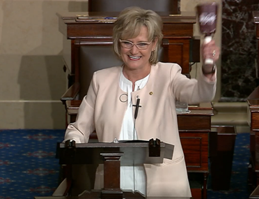 ON SENATE FLOOR, HYDE-SMITH RINGS MSU COWBELL TO CELEBRATE COLLEGE WORLD SERIES TEAM