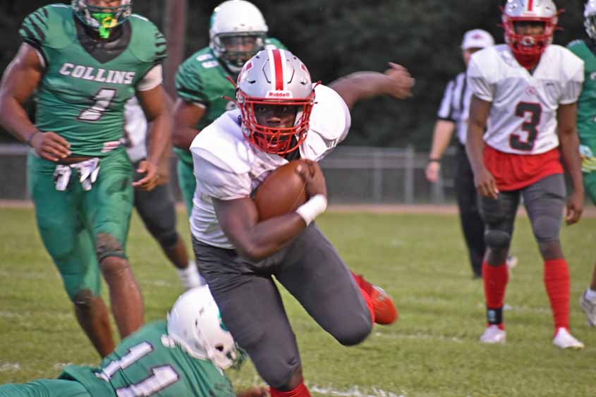 Trojans Tame the Tigers