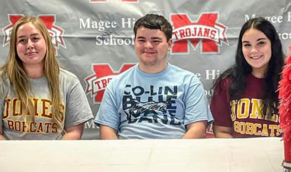 3 Trojans Sign Music Scholarships