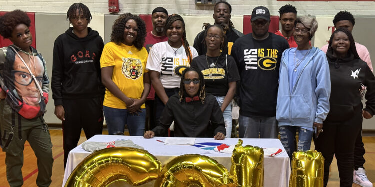 MHS Trojan Basketball Stand out Nicole Sandifer Signs with Grambling