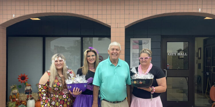 Ladies of Stanley Graves Plumbing Trick or Treat on Main Street