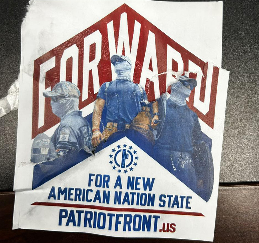 Patriot Front, white supremacist organization,  posting signs at local gas stations
