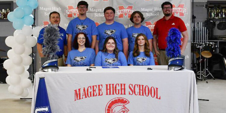 Seven Magee High School Band Students Sign Scholarships to Colin