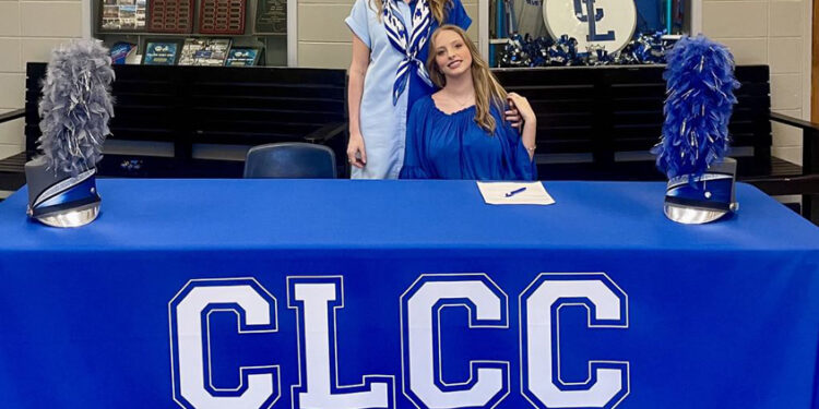 Laken Clark signs Color Guard Scholarship with Co-Lin Blue Wave