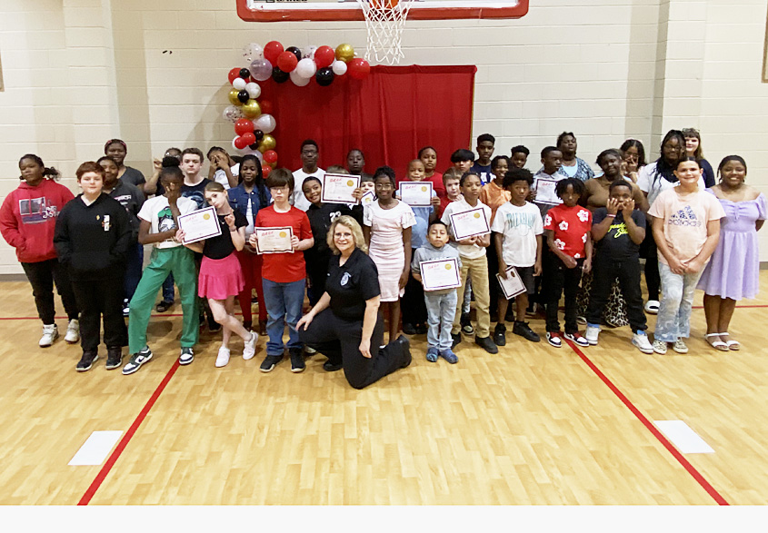 Seventy-seven Magee Elementary 5th graders graduate from the D.A.R.E. program