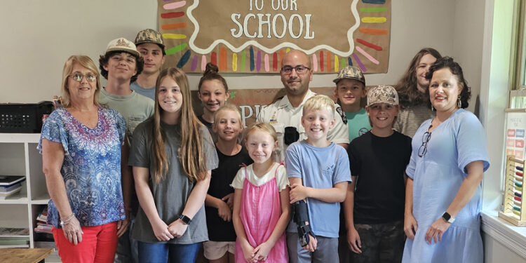 Magee Police Chief Denis Borges visits The Spire Learning Center