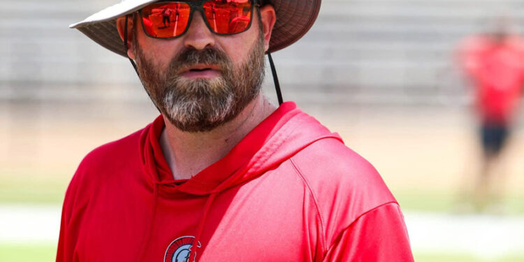 Trojans Coach Courtney Urges Team to Keep Fighting After Loss