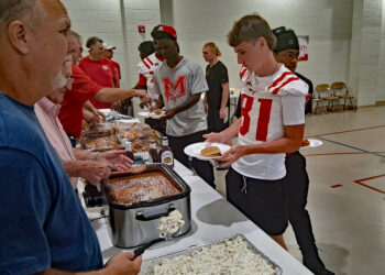 FBC Brotherhood Feeds Magee Football Players, Cheerleaders and Band