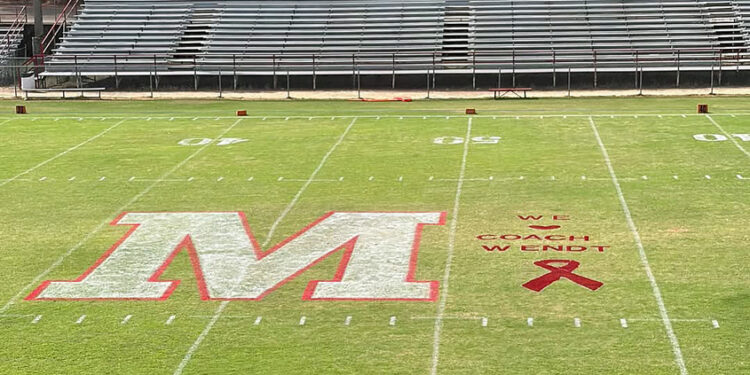Magee Honors Coach Dick Wendt